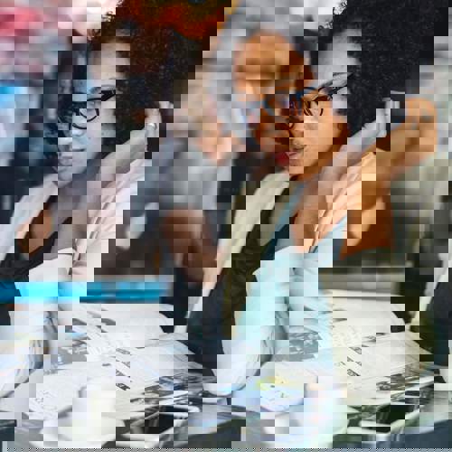 Women looking at magazine