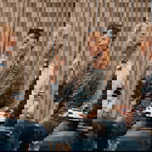 Group sitting in circle talking.